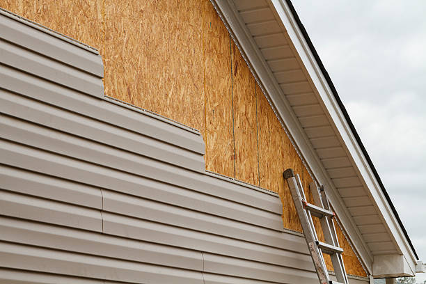 Professional Siding Replacement technician working in Poulsbo, WA